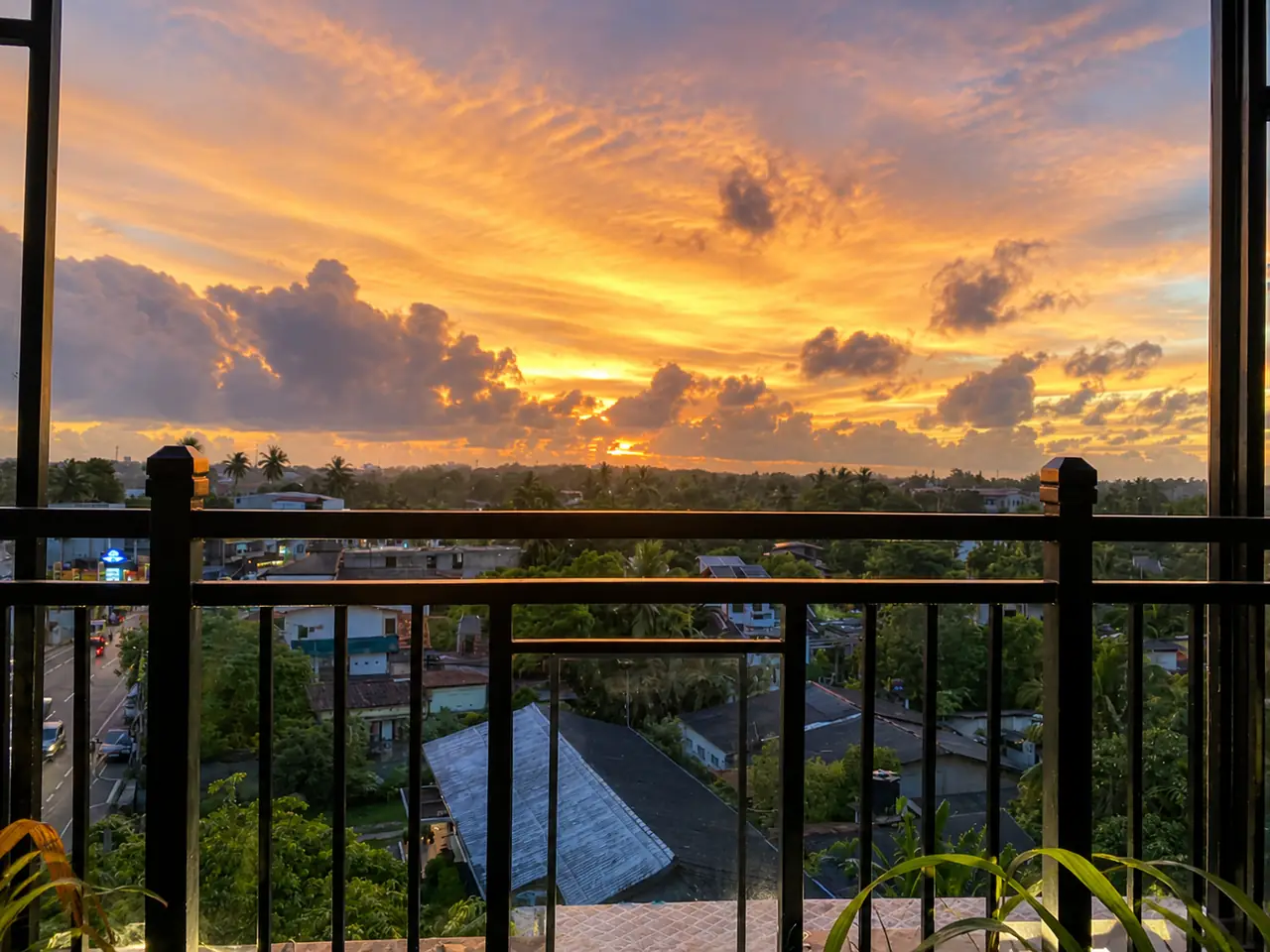Sunset view from Hotel Rosenro overlooking Piliyandala and the surrounding neighborhood.